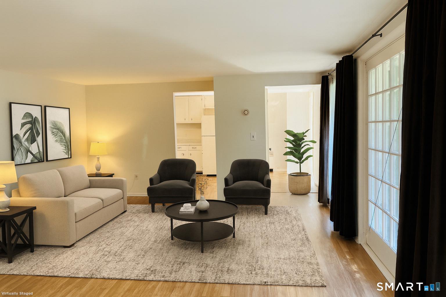 2820 High Ridge Road Stamford, CT 06903 - Photo 11 of 25 a living room with furniture and a large window