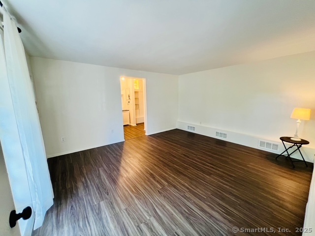 2820 High Ridge Road Stamford, CT 06903 - Photo 13 of 25 a view of empty room with wooden floor and fan