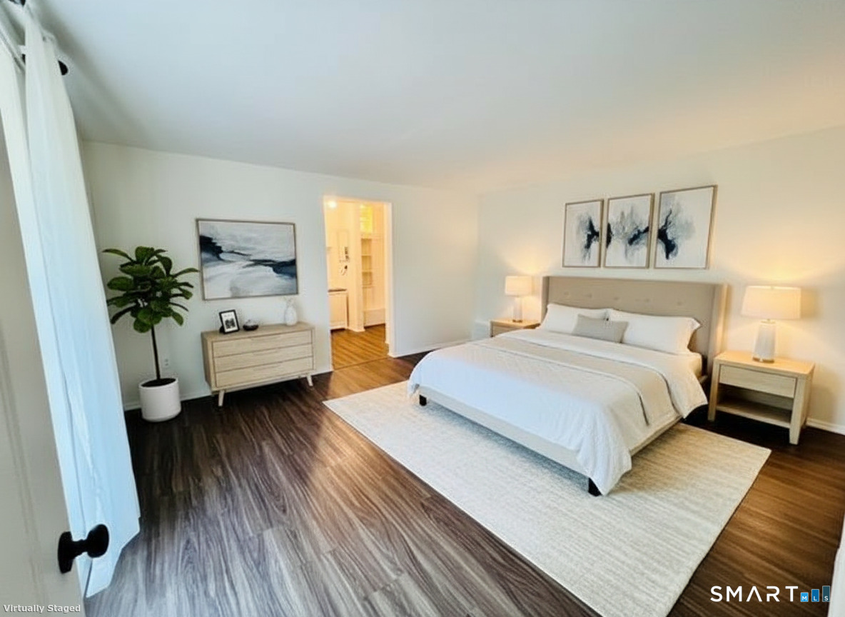 2820 High Ridge Road Stamford, CT 06903 - Photo 14 of 25 a bedroom with a bed and a couch