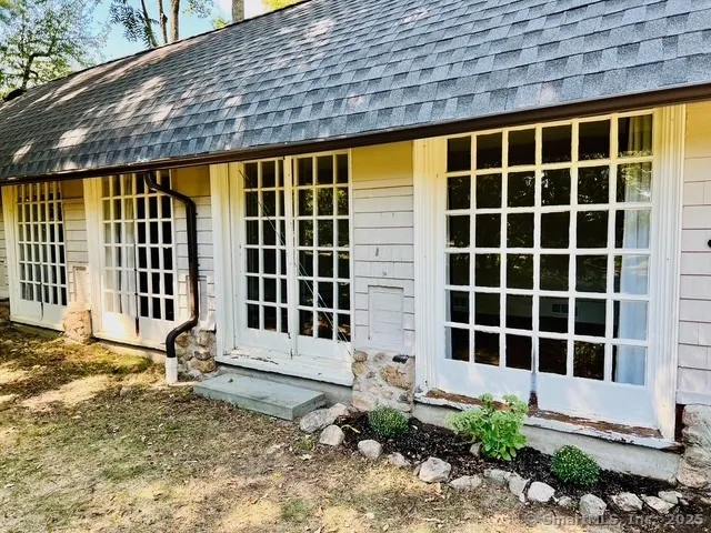 a front view of a house with a garage