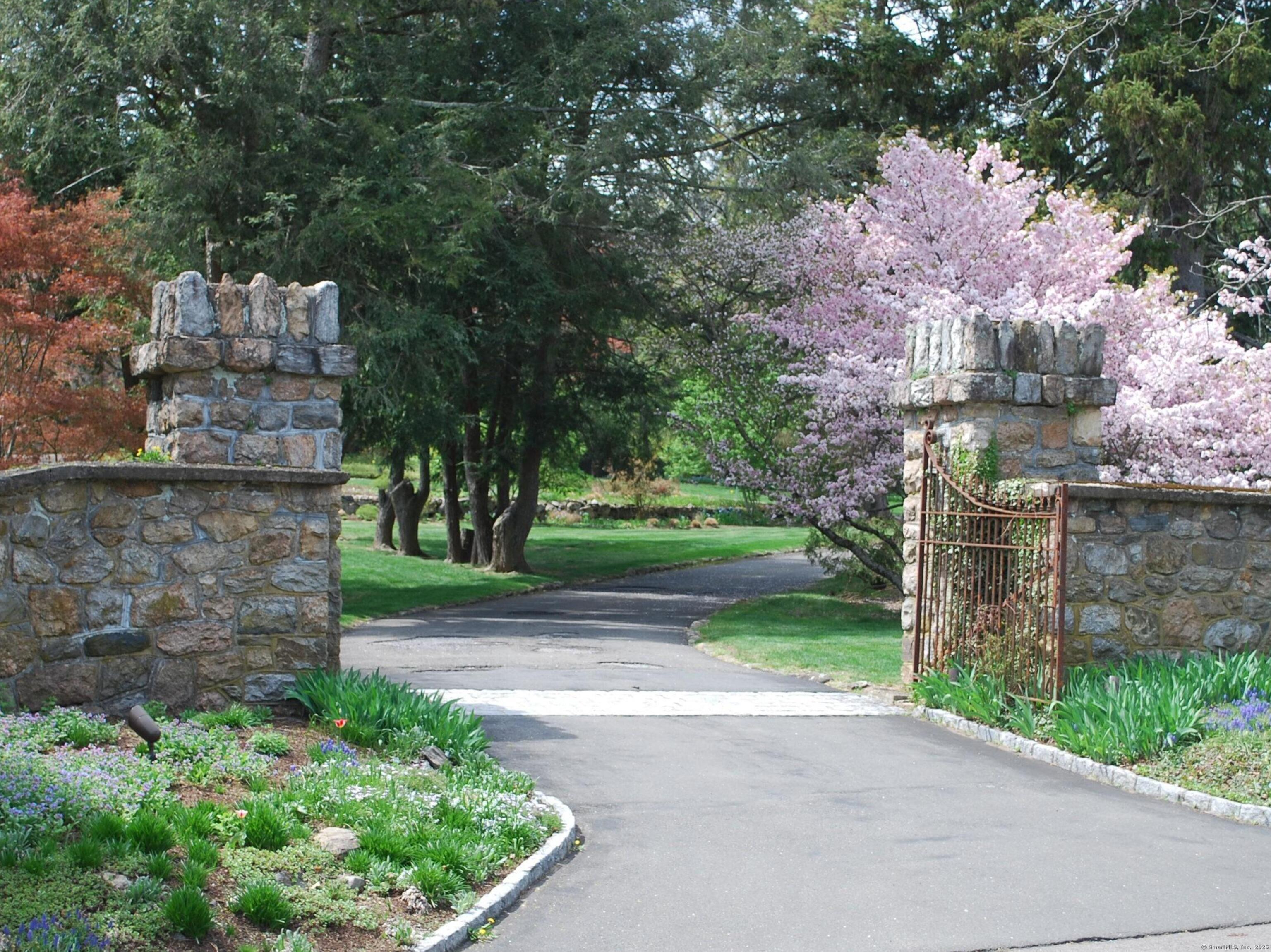 2820 High Ridge Road Stamford, CT 06903 - Photo 2 of 25 a front view of a house with garden