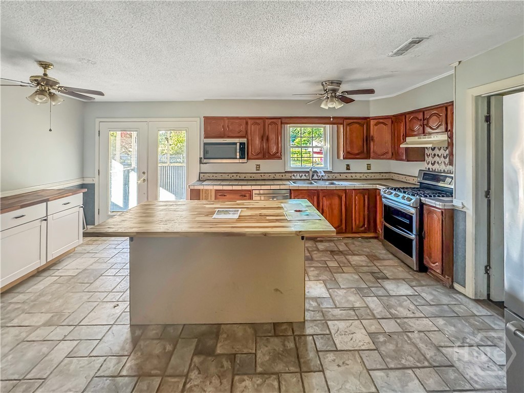 209 Lewis Drive Rincon, GA 31326 - Photo 5 of 14 Spacious Kitchen