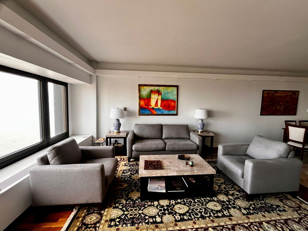 175 East Delaware Place, Unit 4603 Chicago, IL 60611 - Photo 2 of 17 a living room with furniture and a flat screen tv