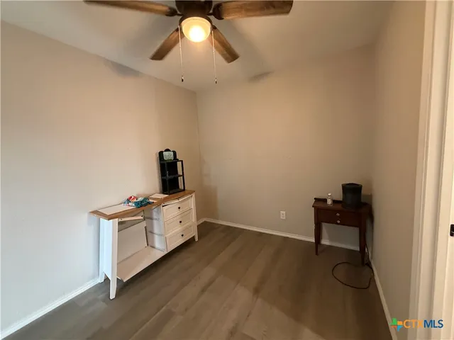 a kitchen with a sink and breakfast area