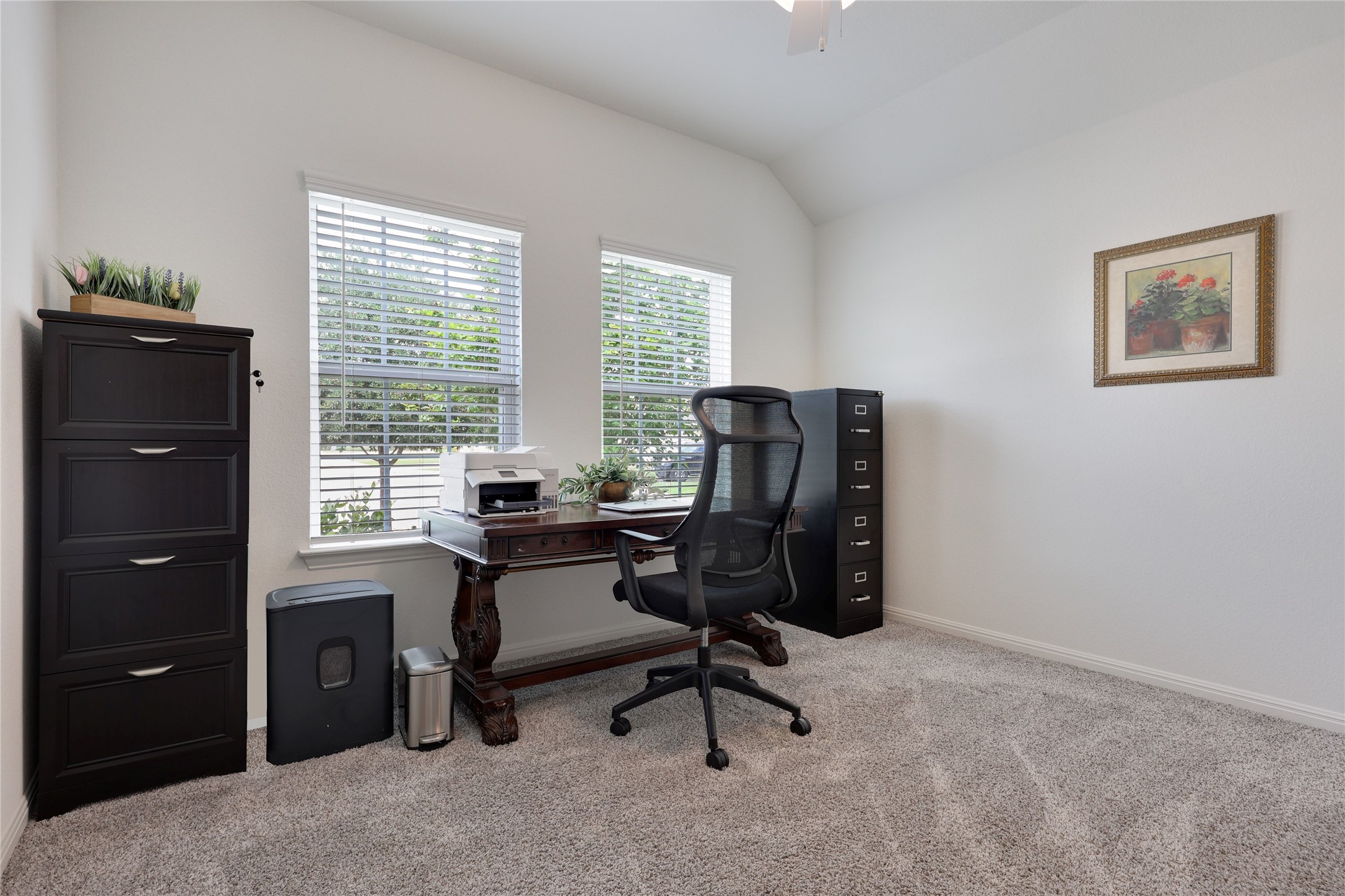 240 Prato Place Georgetown, TX 78628 - Photo 23 of 40 The room features two windows with blinds, light-colored walls, and carpeting