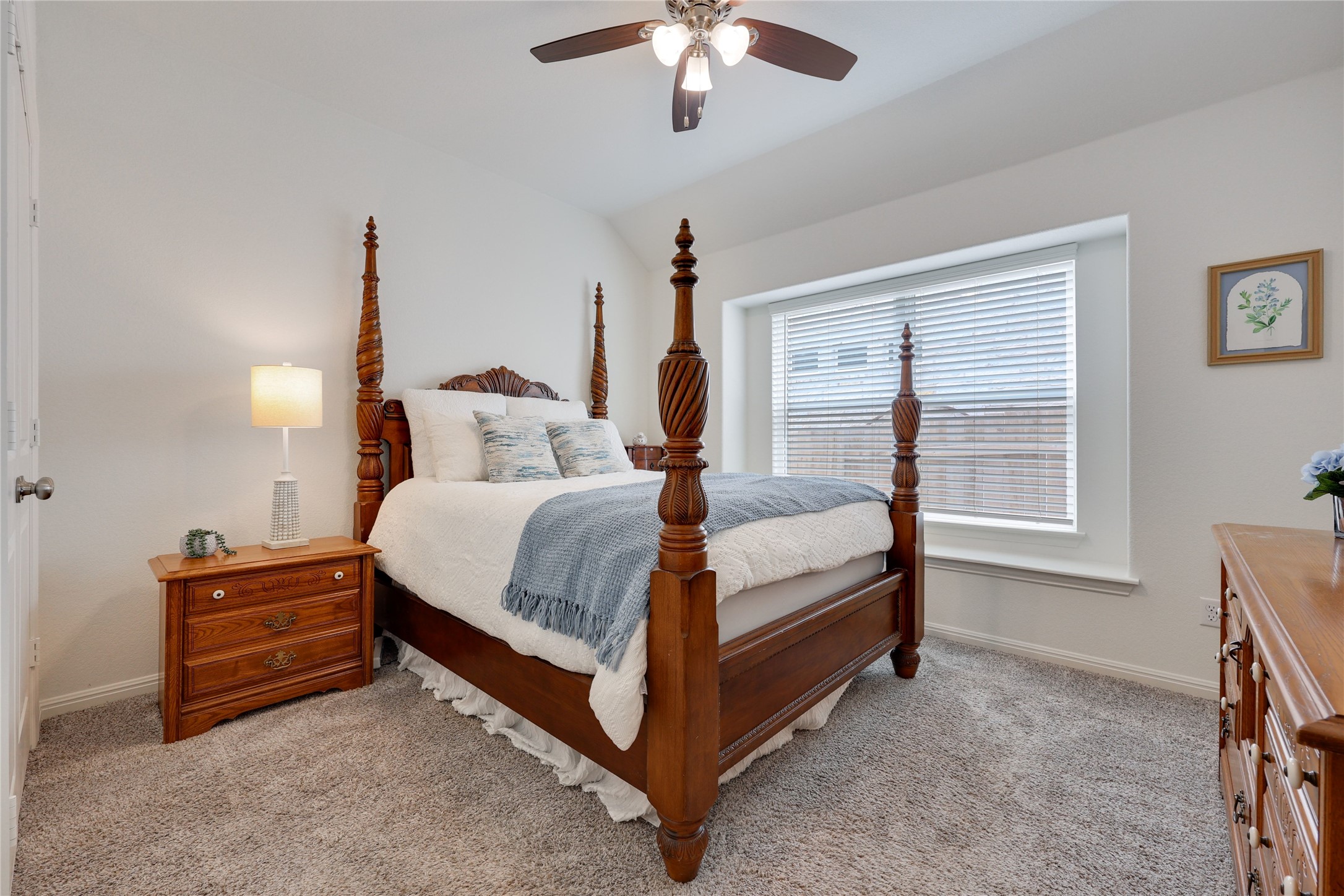 240 Prato Place Georgetown, TX 78628 - Photo 24 of 40 This bedroom features carpeted flooring, a window with blinds, and a ceiling fan