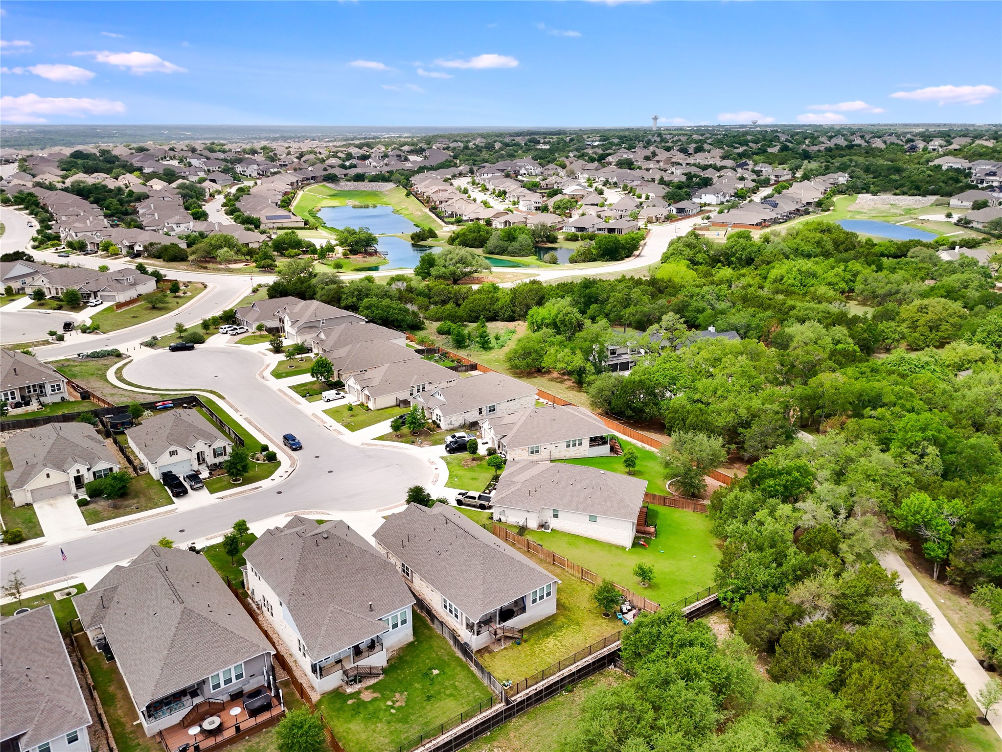 240 Prato Place Georgetown, TX 78628 - Photo 37 of 40 This property is situated within a developed community featuring paved roads, residential properties, and areas of mature trees