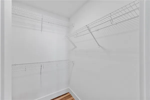 a view of a room with racks on the wall