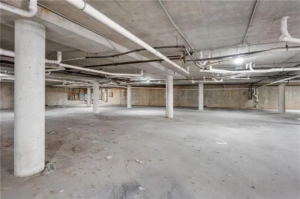 a view of a room with wooden walls