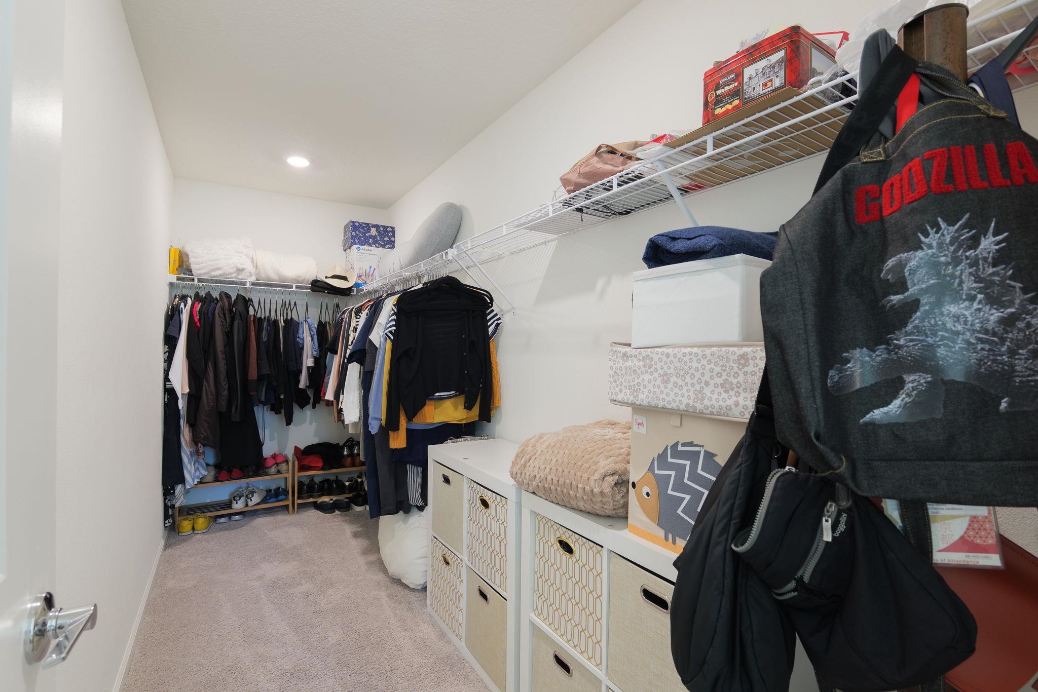 28 Peace River Road St. Johns, FL 32259 - Photo 16 of 41 a view of walk in closet with clothes and shoes