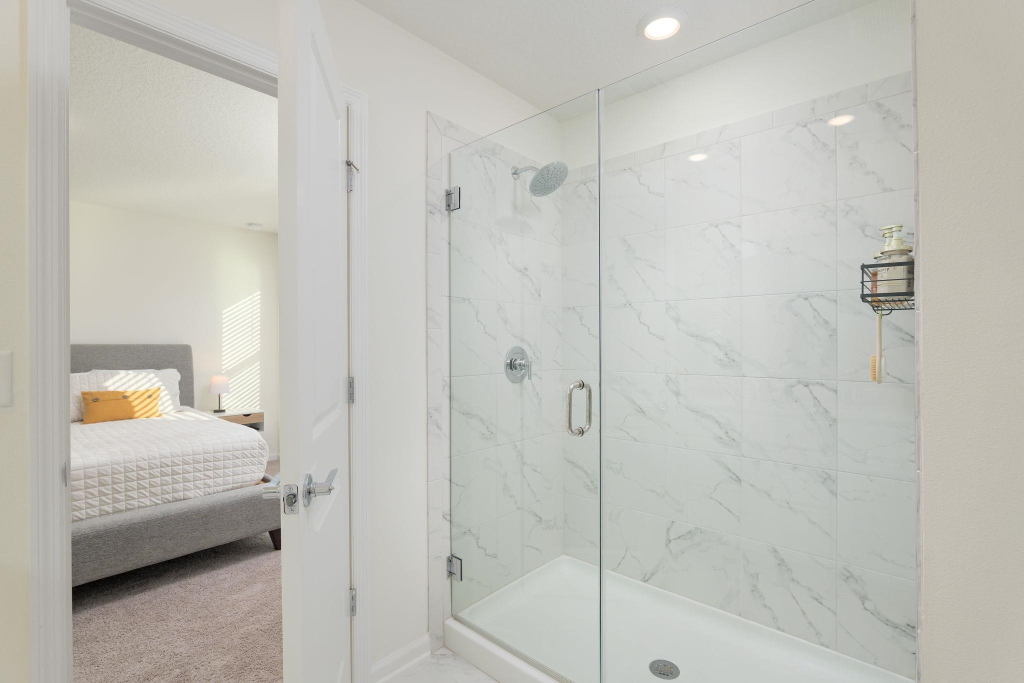 28 Peace River Road St. Johns, FL 32259 - Photo 19 of 42 a bathroom with a shower and a tub