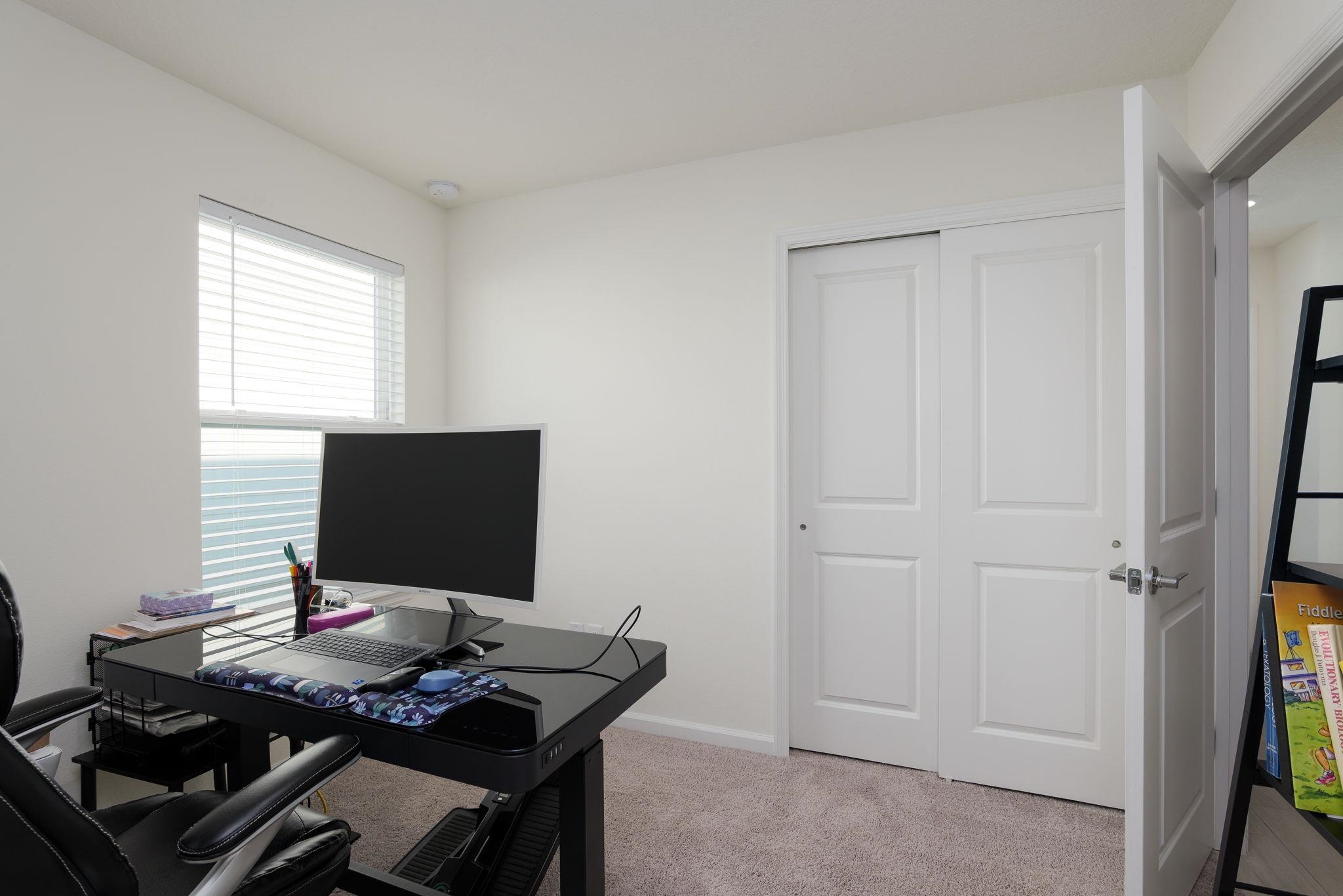 28 Peace River Road St. Johns, FL 32259 - Photo 26 of 42 a desktop computer sitting on top of a desk