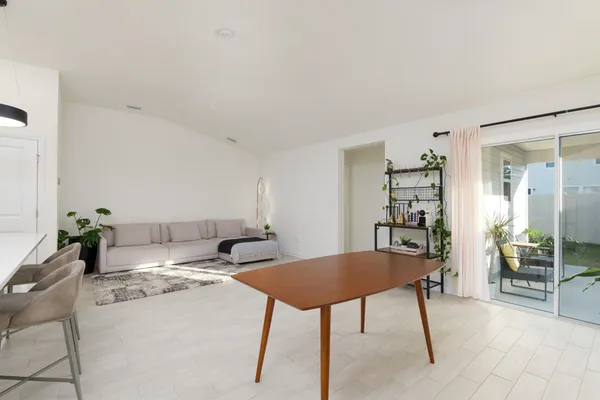 a workspace with furniture and window