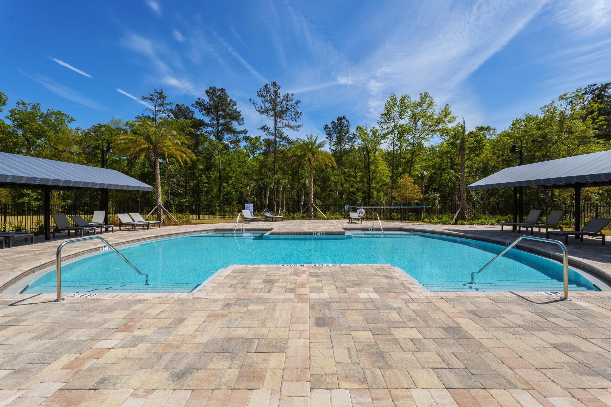 28 Peace River Road St. Johns, FL 32259 - Photo 37 of 41 a view of a swimming pool with a patio