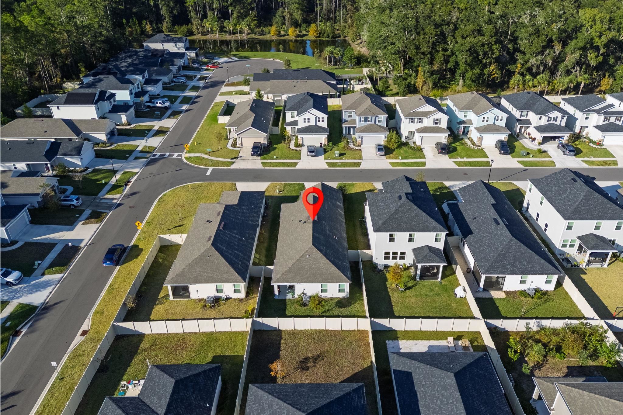 28 Peace River Road St. Johns, FL 32259 - Photo 36 of 42 an aerial view of a houses with outdoor space and swimming pool