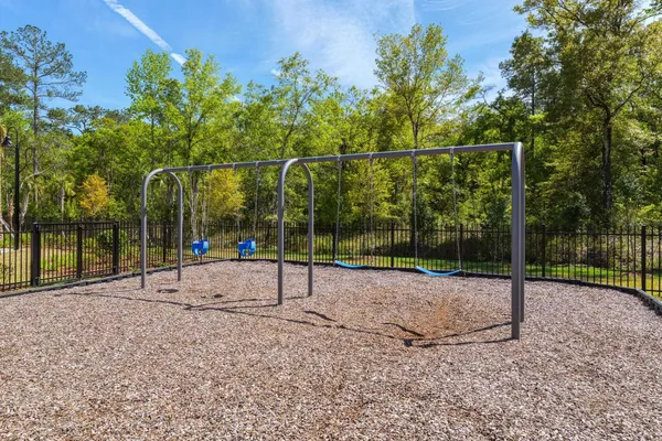 a view of park with a slide