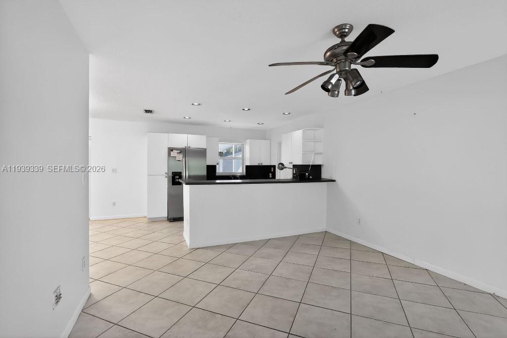 9900 Southwest 164th Terrace Miami, FL 33157 - Photo 14 of 44 a view of a kitchen with a sink and cabinets