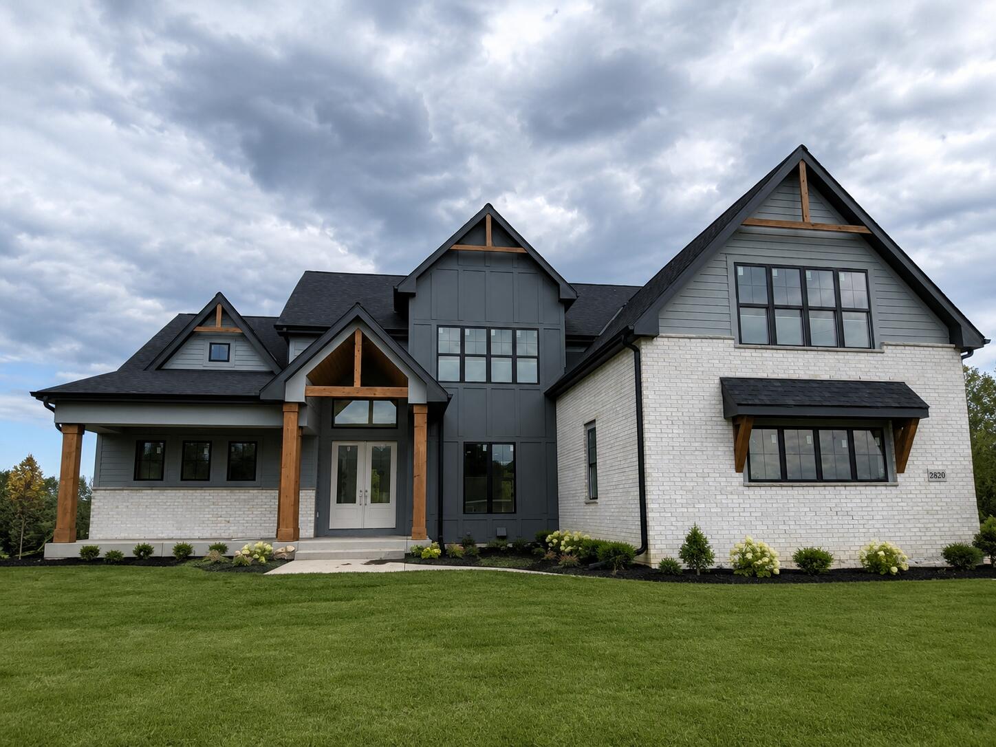 2820 Crosswinds Way Delafield, WI 53029 - Photo 1 of 2 Front Elevation with rendered landscape
