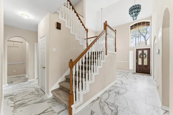 a bathroom with a sink vanity and a mirror