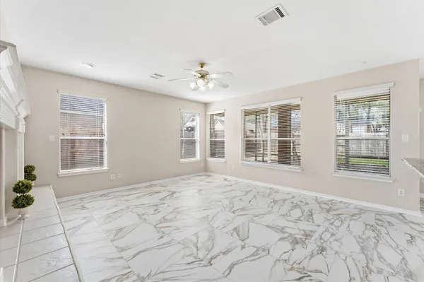 a bathroom with a shower curtain and a sink