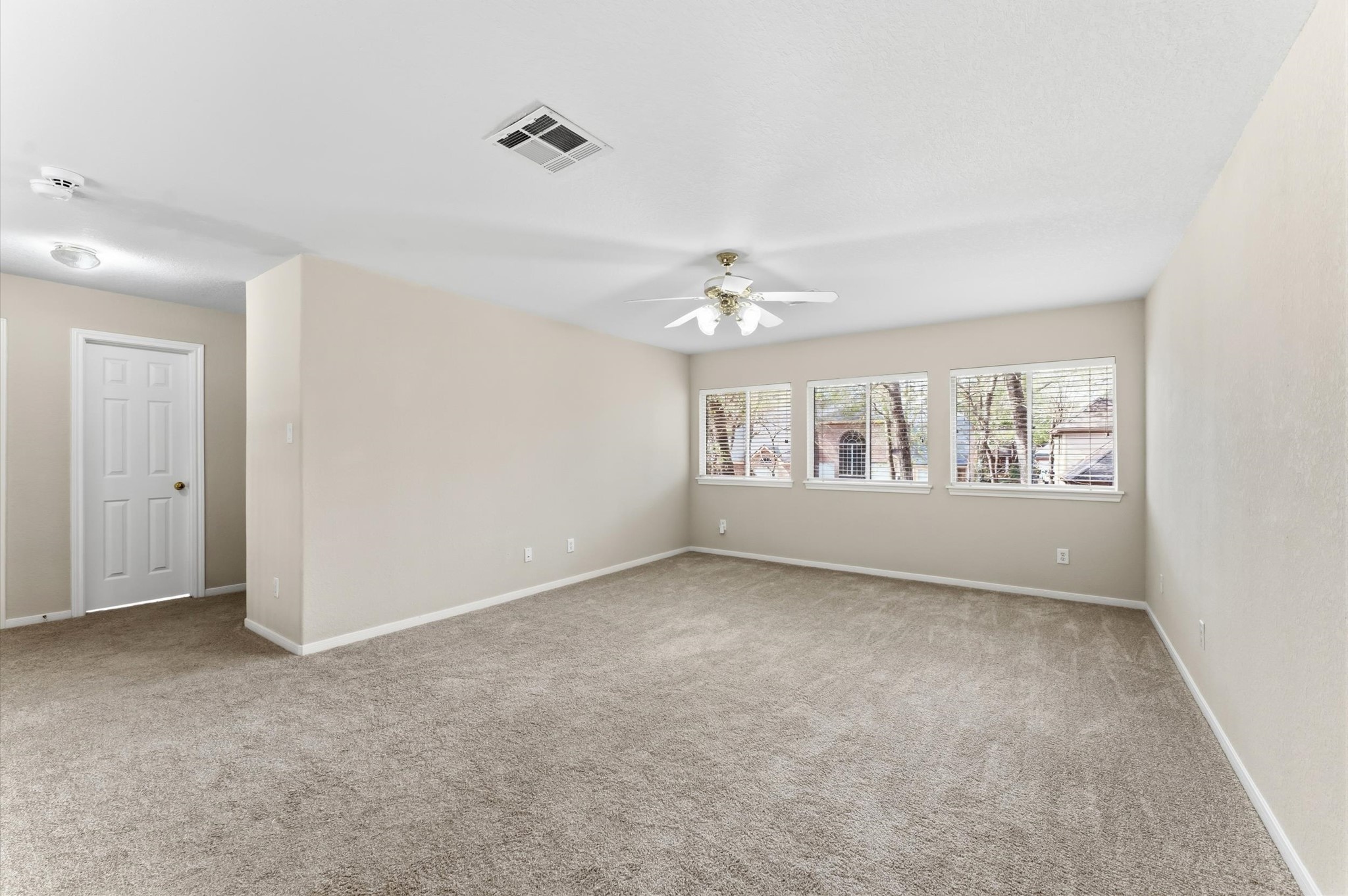 91 South Downy Willow Circle Spring, TX 77382 - Photo 36 of 50 a view of an empty room with chandelier fan