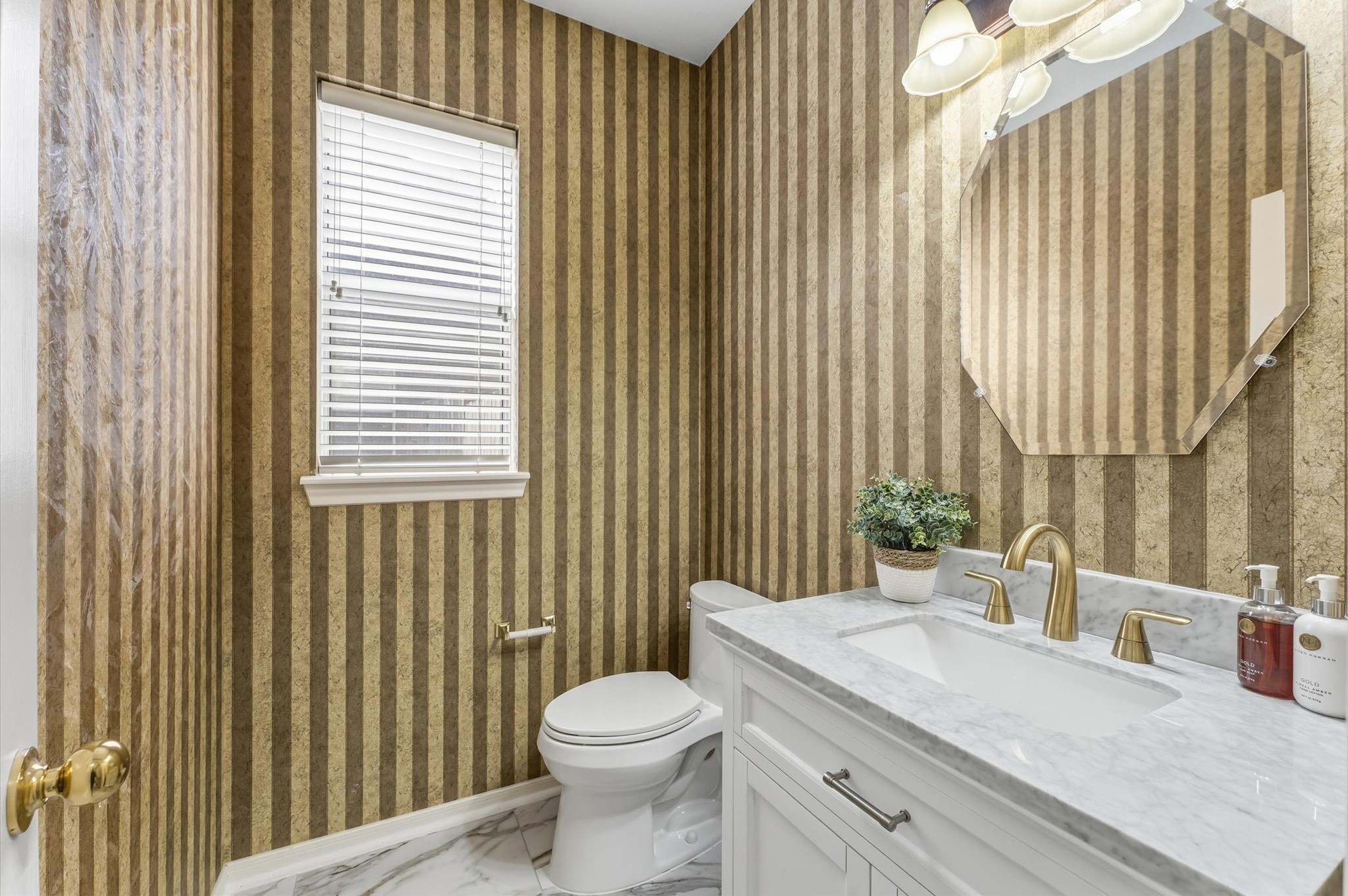 91 South Downy Willow Circle Spring, TX 77382 - Photo 10 of 50 a bathroom with a granite countertop sink a toilet and mirror