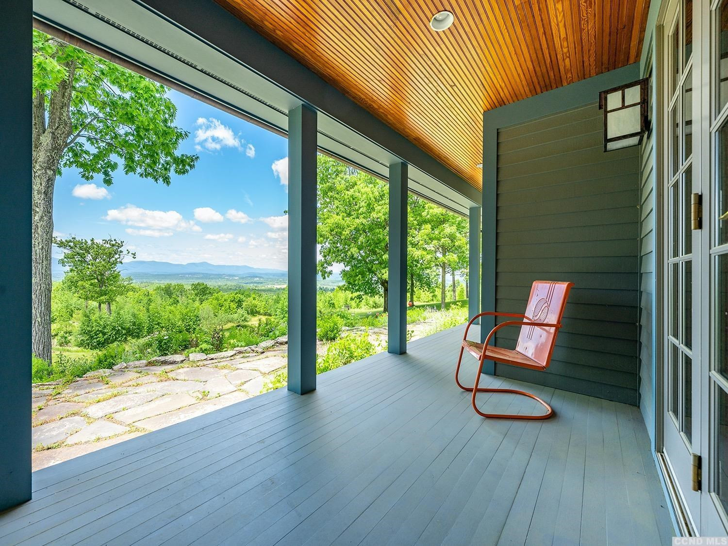 730 Oak Hill Road Claverack, NY 12534 - Photo 12 of 33 a bench sitting in front of a building