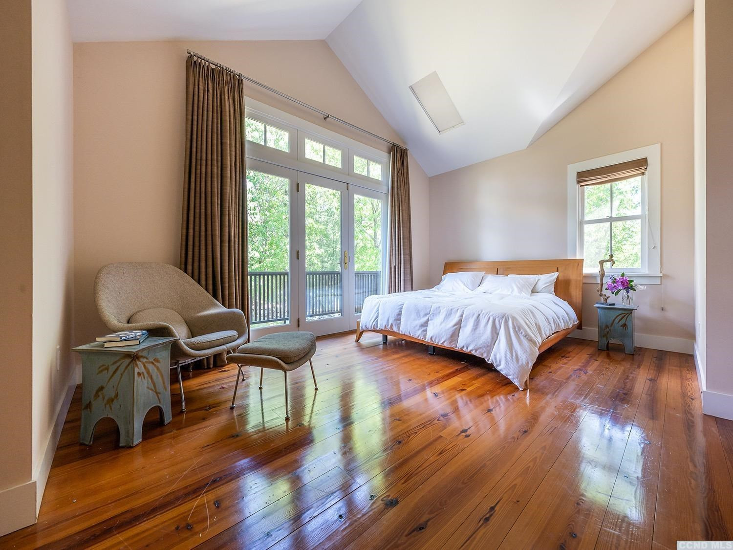 730 Oak Hill Road Claverack, NY 12534 - Photo 14 of 33 a bedroom with a bed and a wooden floor