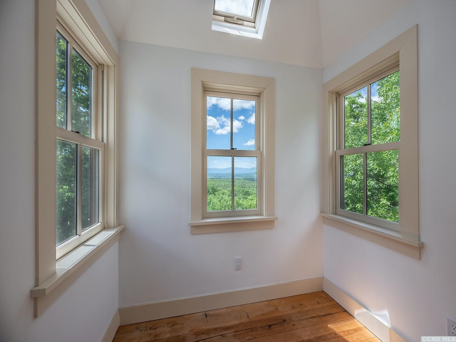 730 Oak Hill Road Claverack, NY 12534 - Photo 19 of 33 a view of a room with wooden floor and windows