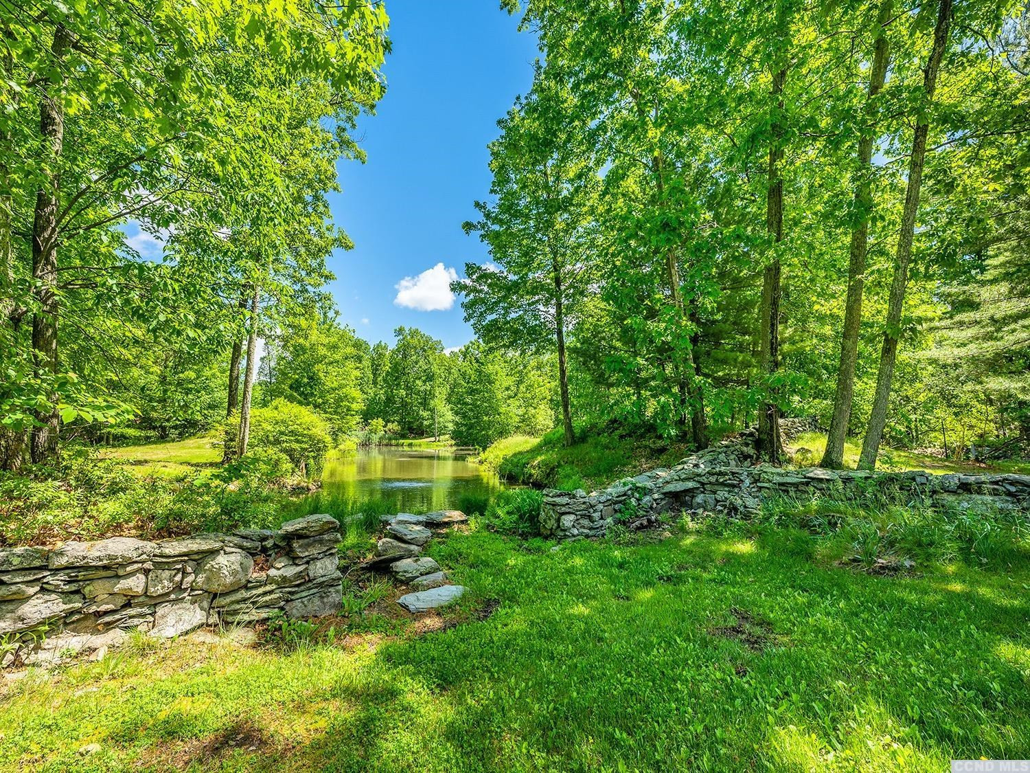 730 Oak Hill Road Claverack, NY 12534 - Photo 22 of 33 a view of a garden with a tree