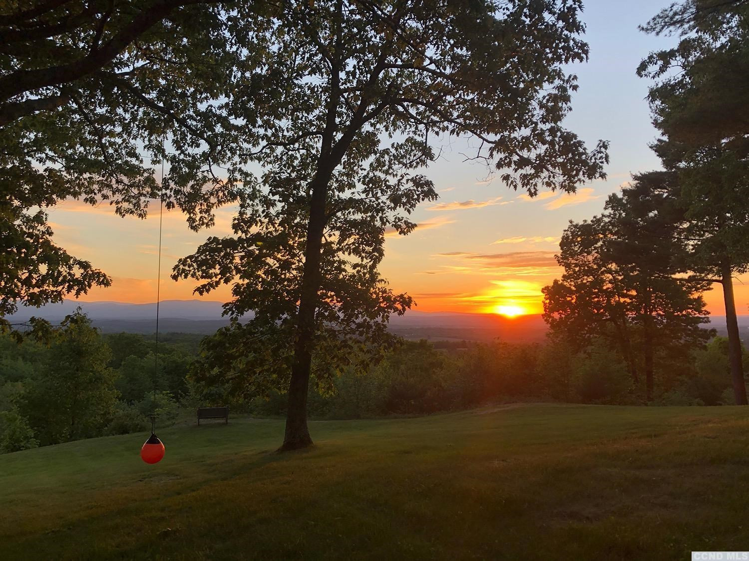 730 Oak Hill Road Claverack, NY 12534 - Photo 33 of 33 a backyard of a house with table and chairs