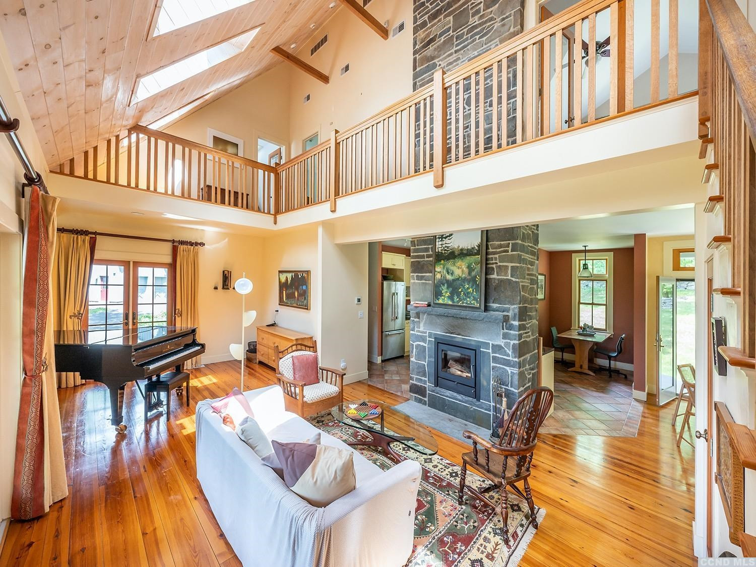730 Oak Hill Road Claverack, NY 12534 - Photo 5 of 33 a living room with furniture a fireplace and a table