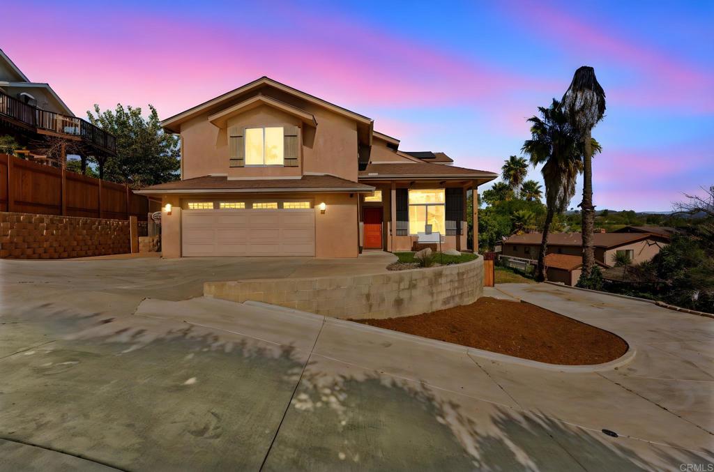 209 Journeys End Vista, CA 92083 - Photo 2 of 55 a front view of a house with a yard