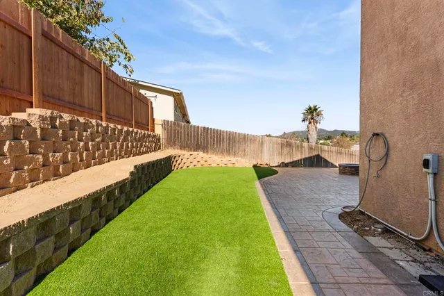 an aerial view of a house with swimming pool