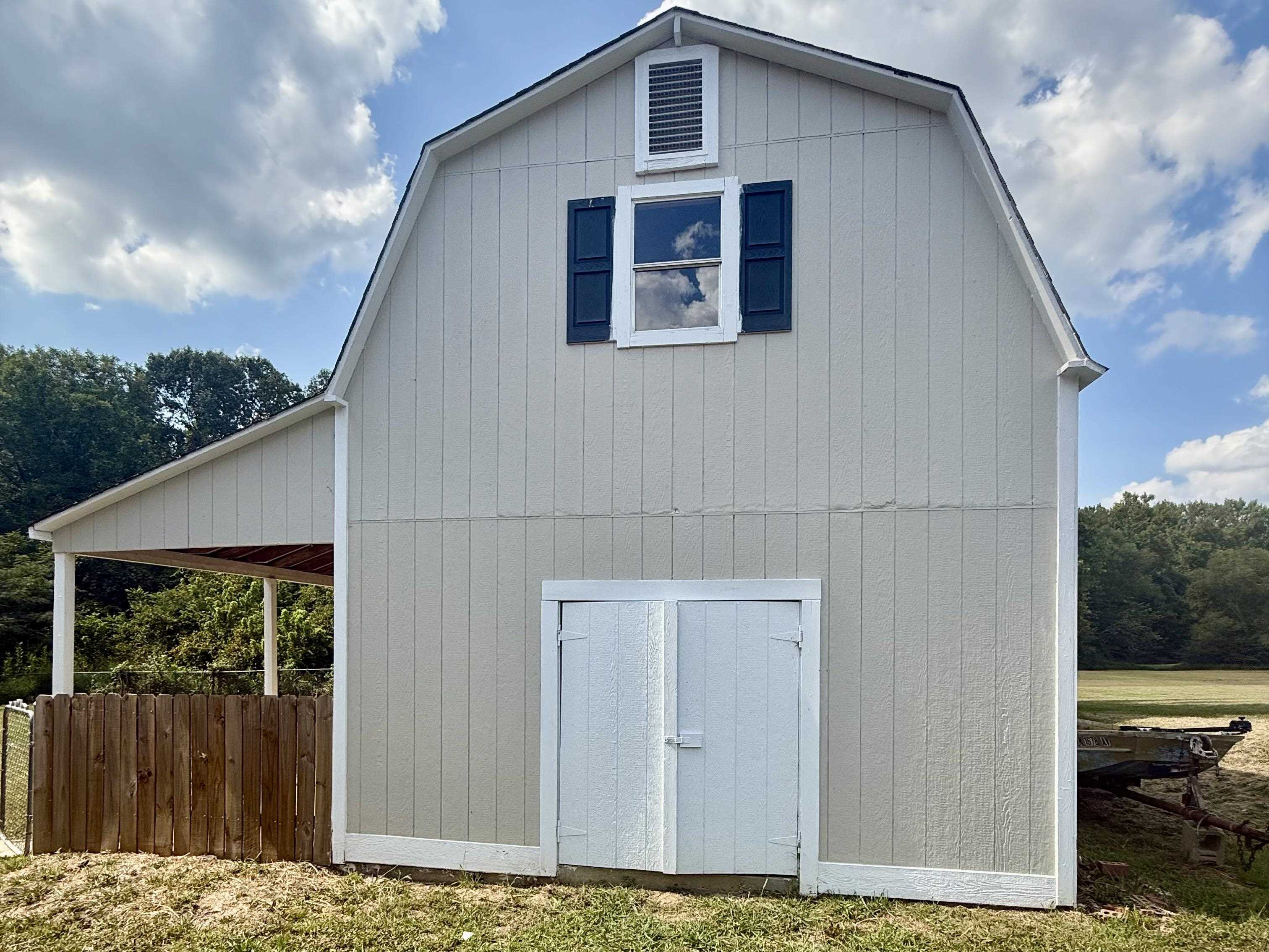 856 Reed Circle Drummonds, TN 38023 - Photo 20 of 24 a front view of a house with a yard