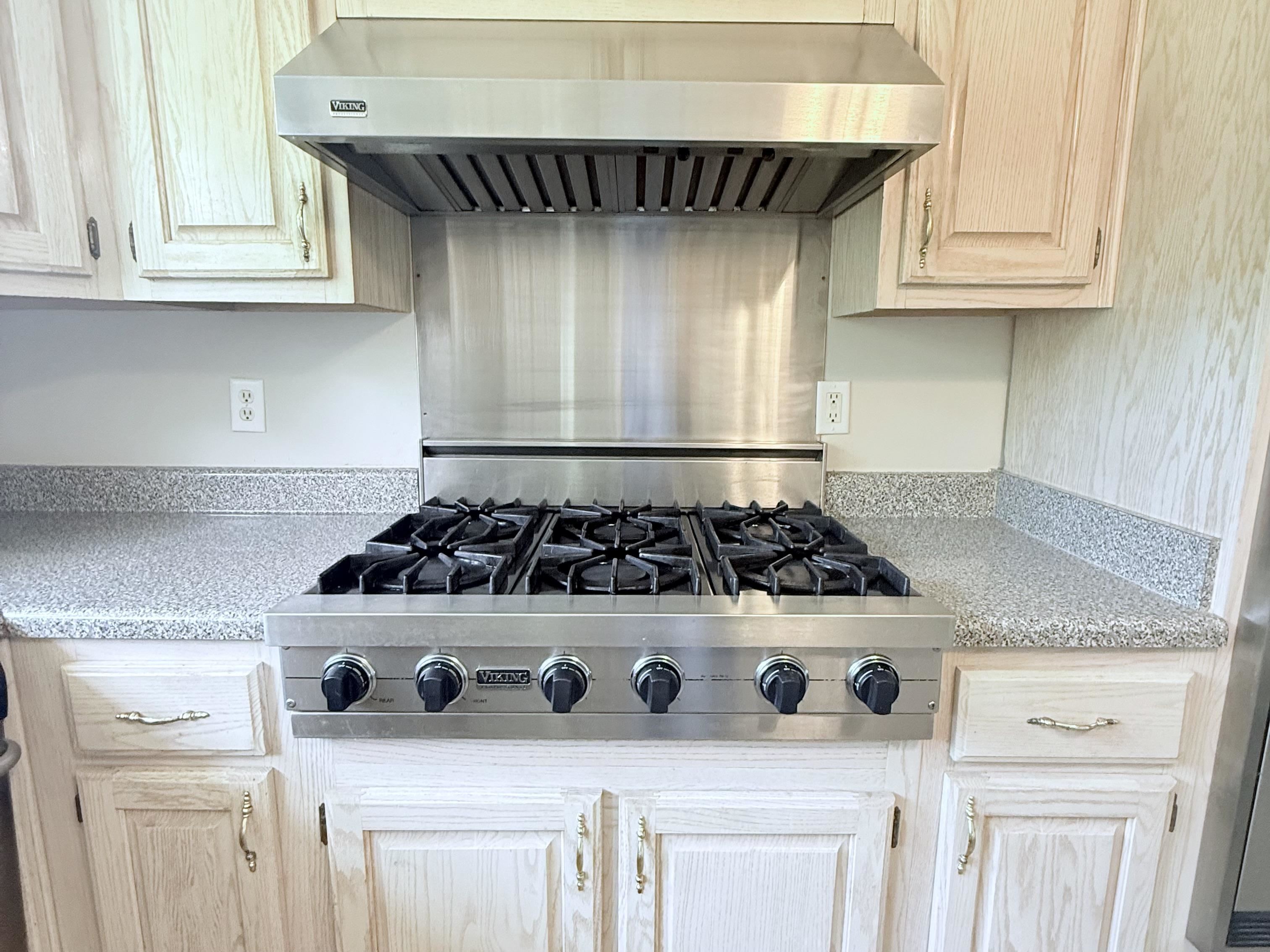 856 Reed Circle Drummonds, TN 38023 - Photo 4 of 24 a white stove top oven sitting inside of a kitchen