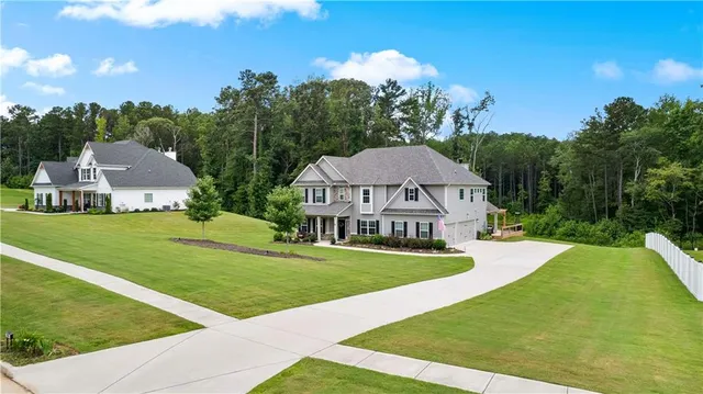 a view of a house with a big yard