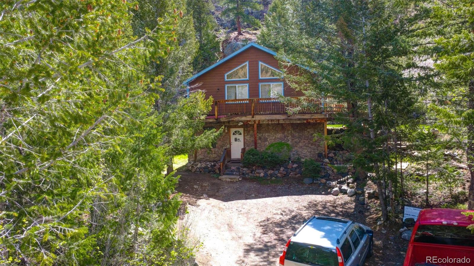 1206 Biddle Street Georgetown, CO 80444 - Photo 28 of 32 a front view of a house with a yard
