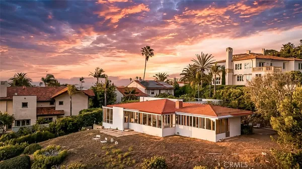 a view of a patio with a yard