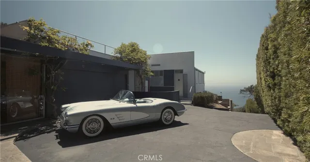 a car parked in front of a house