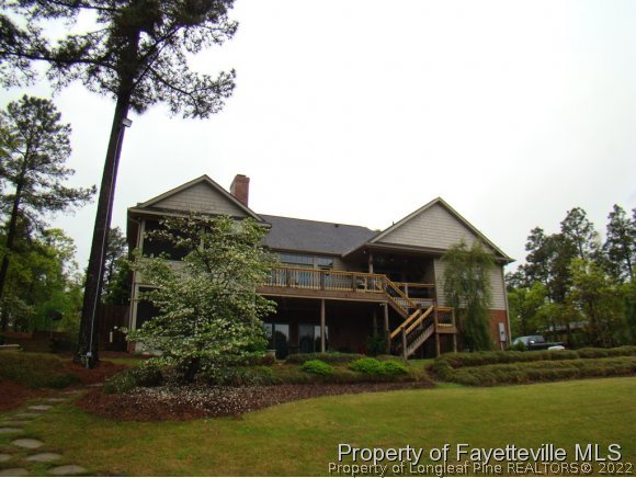 4435 Hoffman Road Jackson Springs, NC 27281 - Photo 21 of 25 a front view of a house with a yard