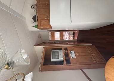 25-46 Woodhaven Sublette, IL 61367 - Photo 11 of 17 a view of kitchen with stainless steel appliances granite countertop cabinets and stove top oven