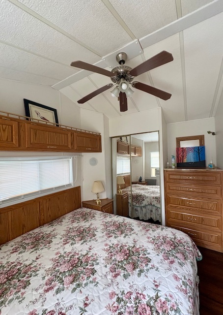 25-46 Woodhaven Sublette, IL 61367 - Photo 13 of 17 a bedroom with a bed and a chandelier