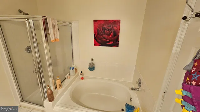 a bathroom with a sink and a shower curtain