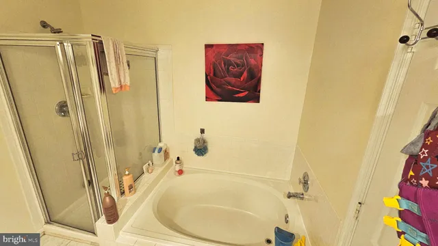 a bathroom with a sink and a shower curtain