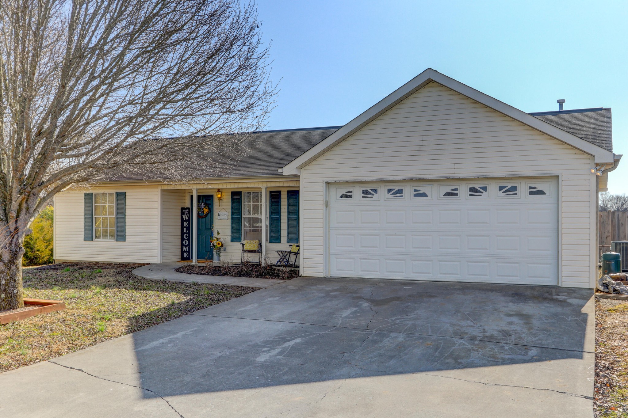 front view of a house with a yard