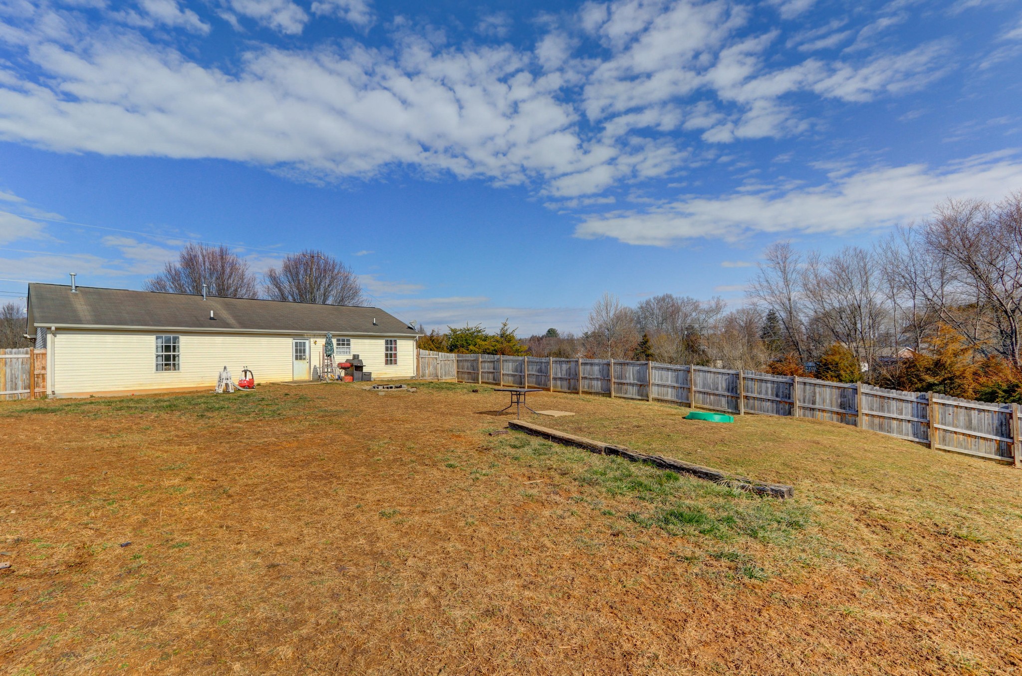 7832 Ralph Youmans Road Corryton, TN 37721 - Photo 14 of 22 a view of a house with a yard and sitting area