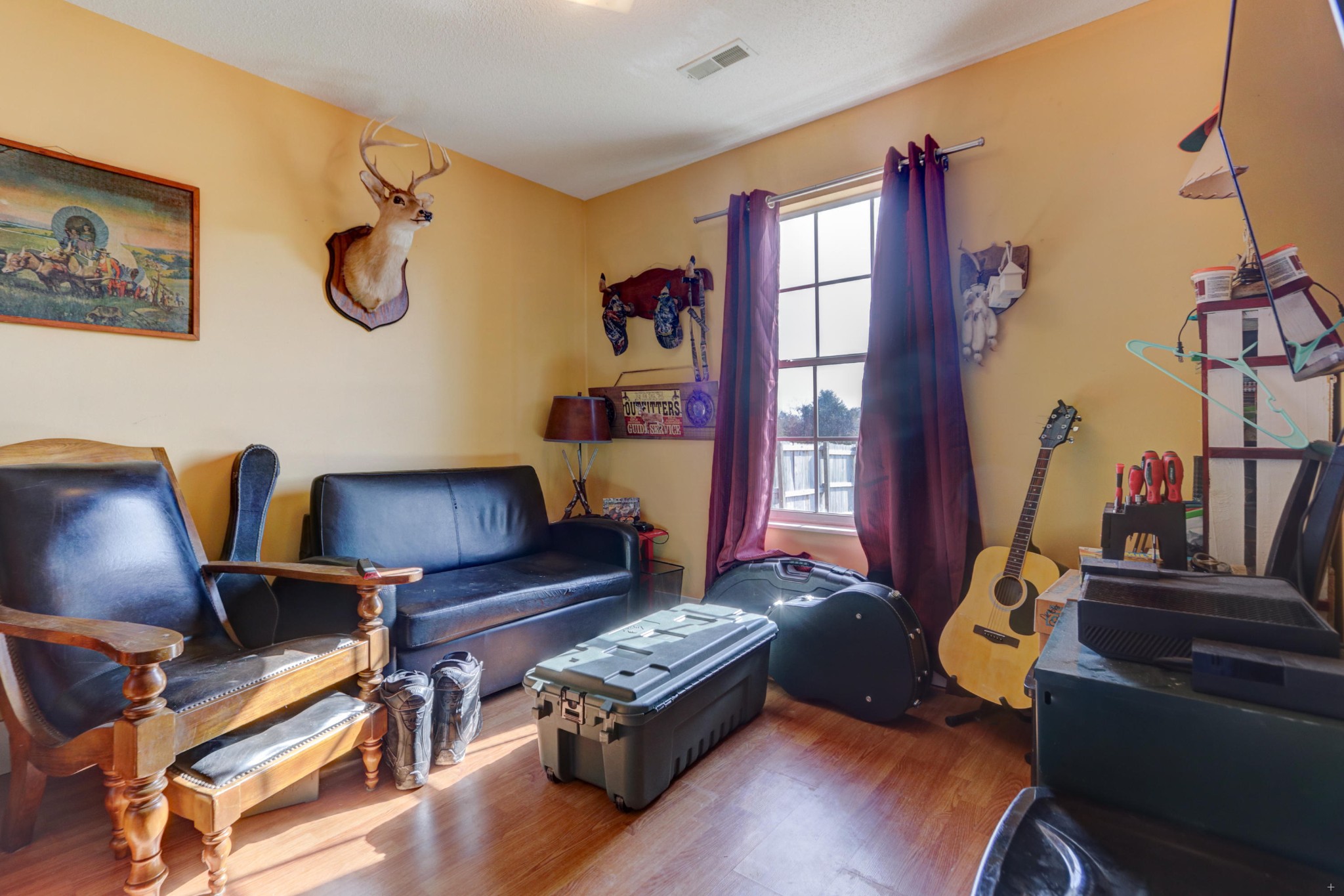 7832 Ralph Youmans Road Corryton, TN 37721 - Photo 16 of 22 a living room with furniture gym equipment and a window