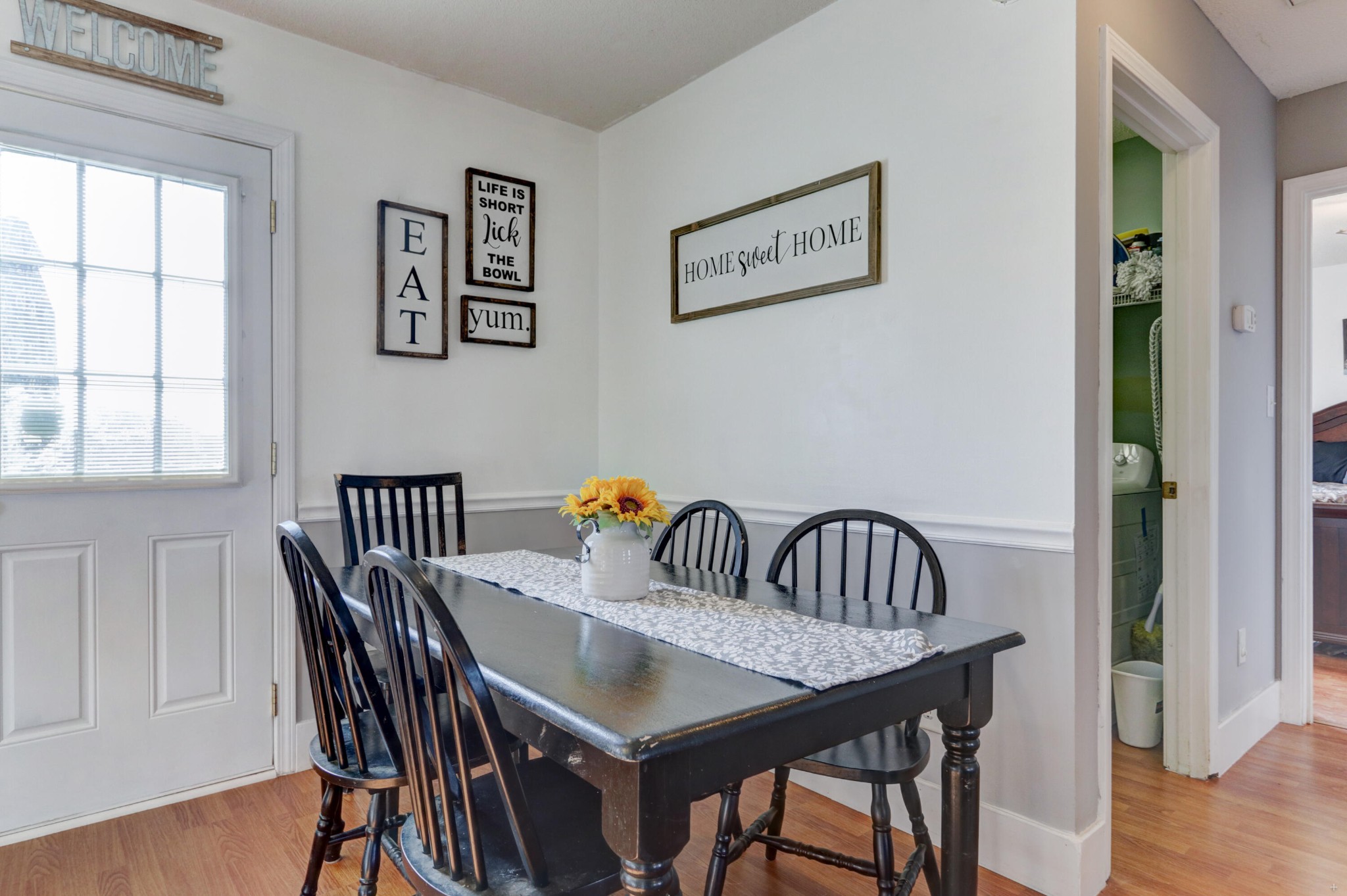 7832 Ralph Youmans Road Corryton, TN 37721 - Photo 9 of 22 a view of a dining room with furniture and wooden floor
