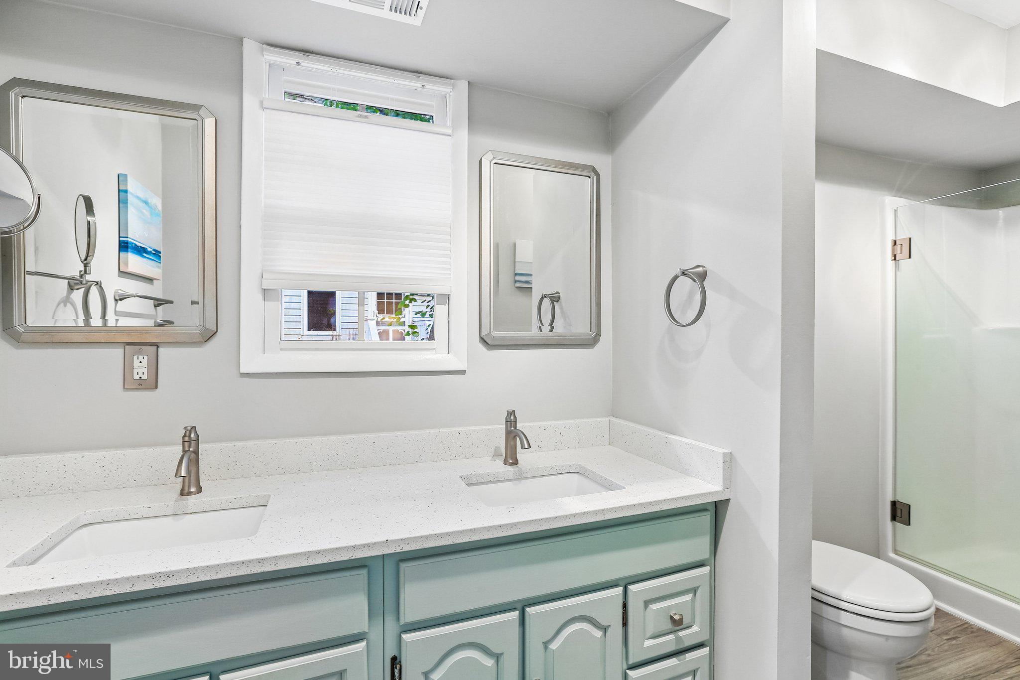 275 Gibson Road Pasadena, MD 21122 - Photo 24 of 59 Serene bathroom with modern touches.